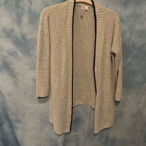 Cozy cream cardigan with black trim